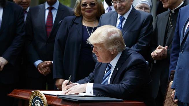 Trump signs executive order permitting lawful discrimination against gay people